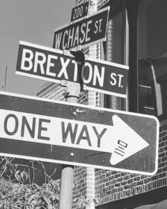 Image of street signs depicted the corner of Chase Street and Brexton Street.
